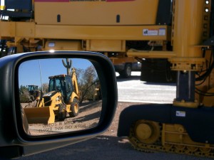 Bulldozer in Rearview Mirror