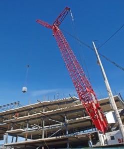 Crane Operator Lifting Material